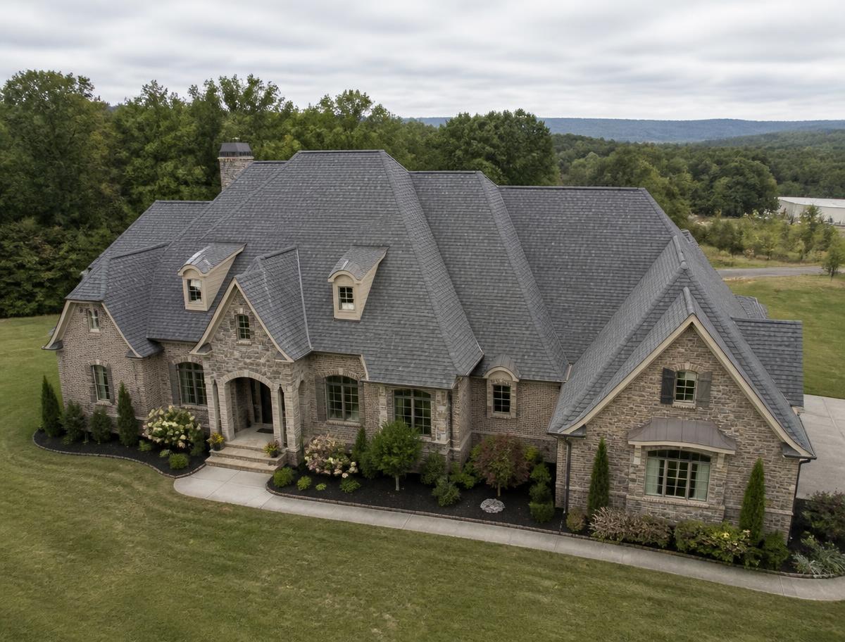 Stone Tennessee home with a new architectural shingle roof